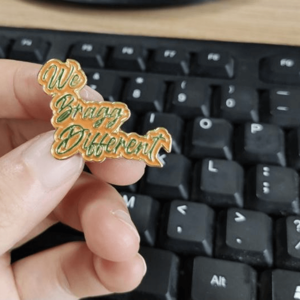 We Bragg Different Enamel Pin
